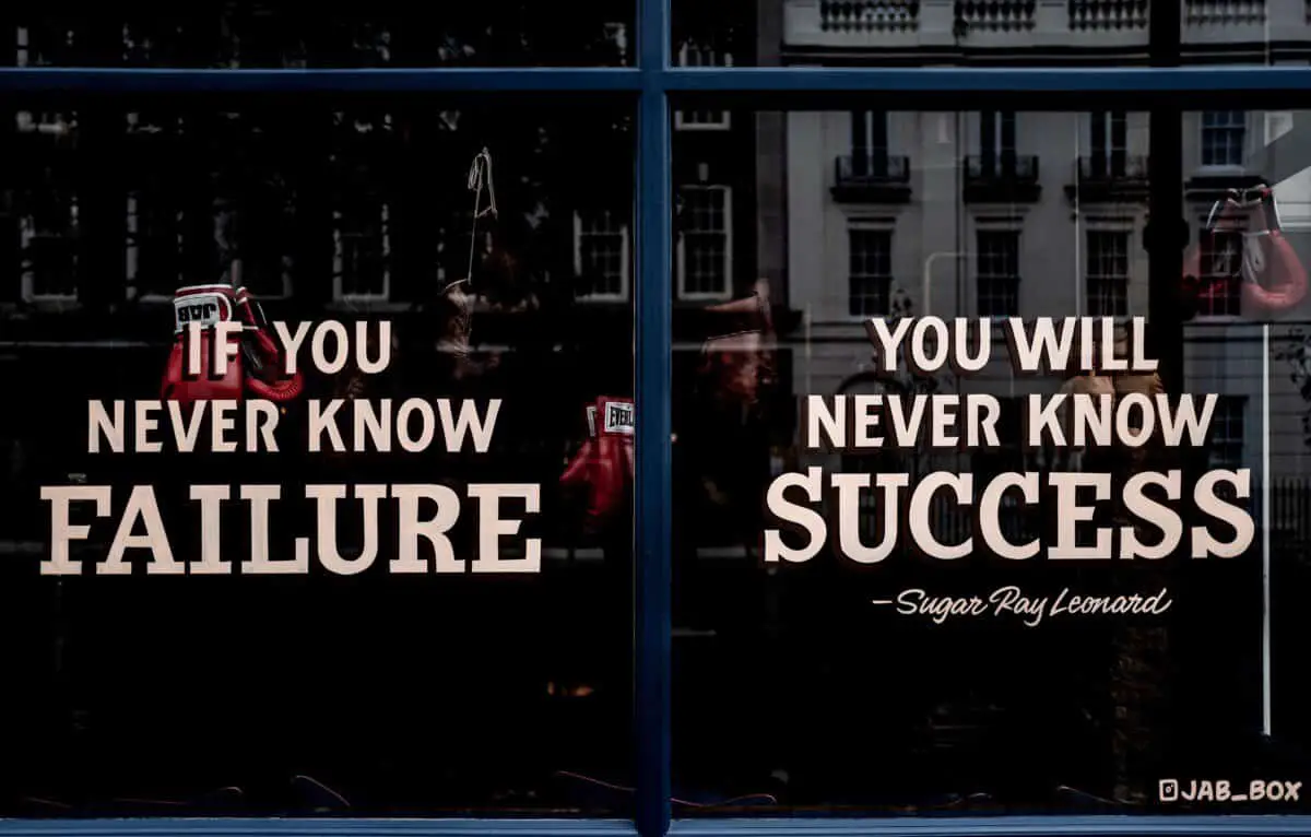 Windows with the words "IF YOU NEVER KNOW FAILURE YOU WILL NEVER KNOW SUCCESS